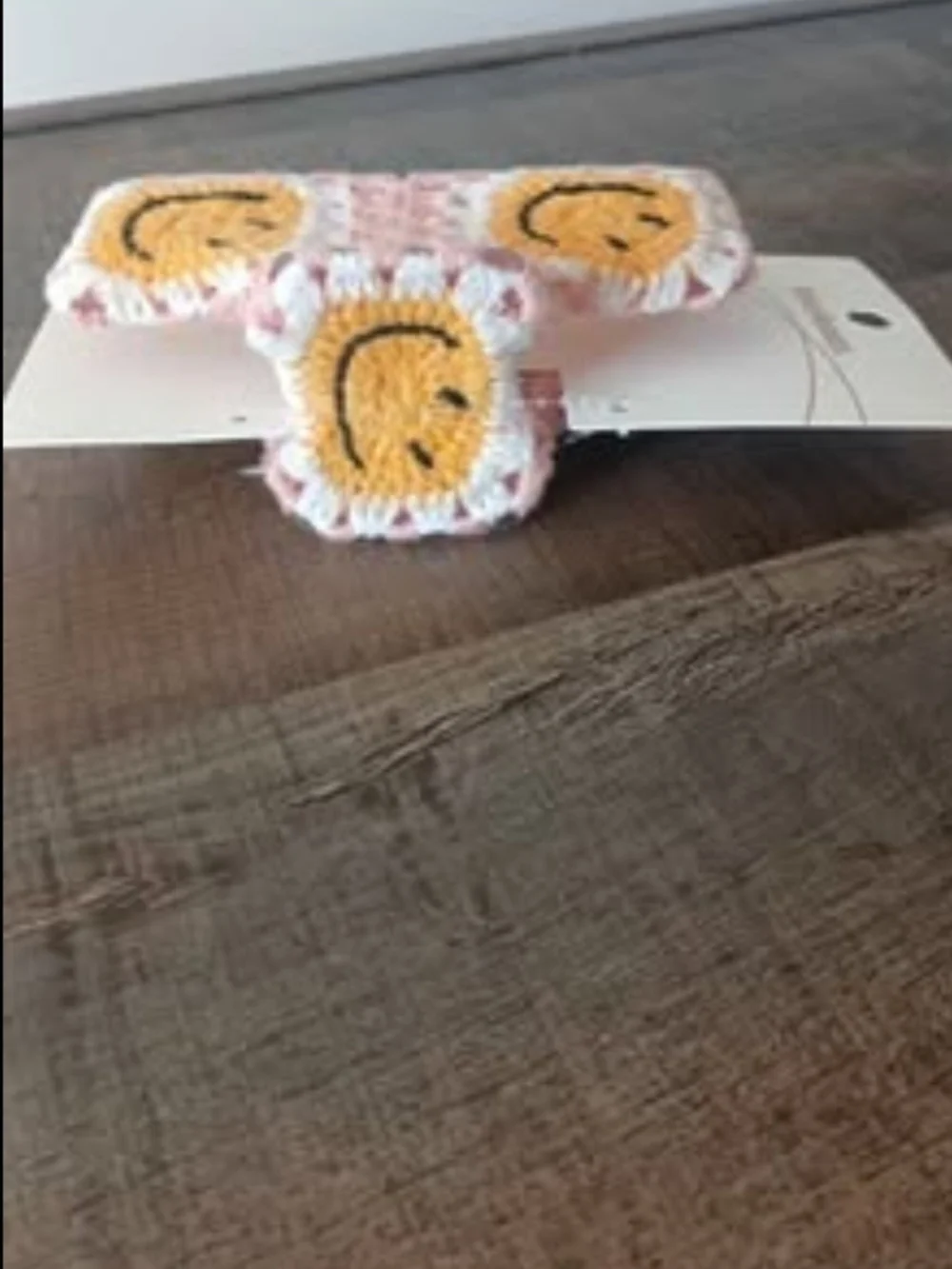 Cost Plus World Market Pink Crochet Hair Clip with Yellow Smiley Faces